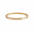 Elegant Laura bracelet jonc in gold, featuring a sleek design and minimalist style, perfect for everyday wear.